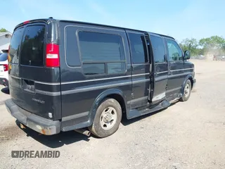 2003 Chevrolet Express Passenger z VIN 1GBFG15X731183644, wystawiony jako IAAI lot #42412871 z przebiegiem 162 202 mil mil oraz . Historia ofert i sprzedaży dostępna na DreamBid. Obrazek 4.