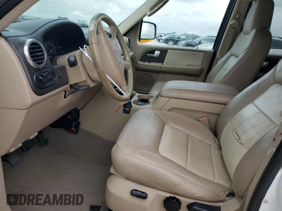 2004 Ford Expedition Eddie Bauer with VIN 1FMPU17L24LA36572, listed as a Copart auction lot 79657644 with 159,518 mi miles and Salvage Title. Bid and sale history available at carsss.com. Image 7.