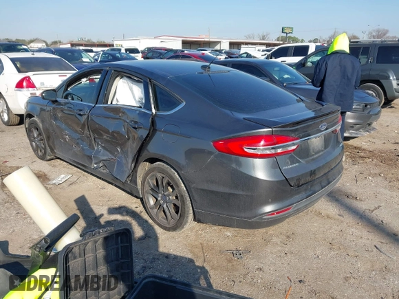 2018 Ford Fusion SE with VIN 3FA6P0HD0JR158536, listed as a IAAI auction lot 41695179 with 114,815 mi miles. Bid and sale history available at carsss.com. Image 3.