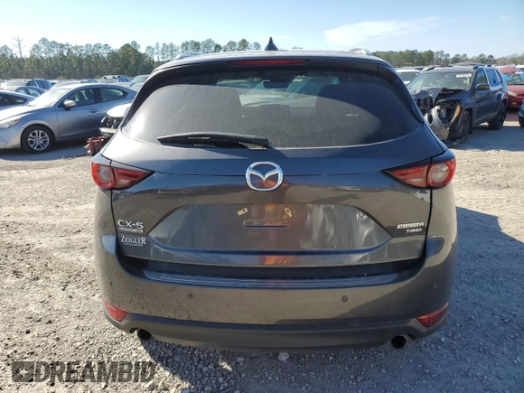 2021 Mazda CX-5 Signature with VIN JM3KFBEY2M0437304, listed as a Copart auction lot 88841415 with 57,100 mi miles and Salvage Title. Bid and sale history available at carsss.com. Image 6.