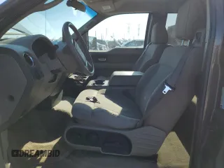 2005 Ford F-150 XLT with VIN 1FTPX12555FB05467, listed as a Copart auction lot 45712335 with 401,186 mi miles and Salvage Title. Bid and sale history available at carsss.com. Image 7.