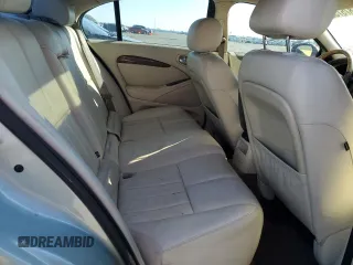 2003 Jaguar S-Type with VIN SAJEA01T93FM46260, listed as a Copart auction lot 87573835 with 129,563 mi miles and Clean Title. Bid and sale history available at DreamBid. Image 10.