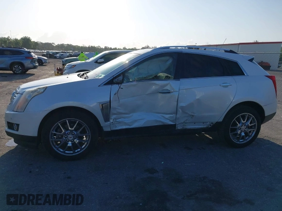2015 Cadillac SRX Premium Collection with VIN 3GYFNDE32FS530357, listed as a IAAI auction lot 41976585 with 92,335 mi miles and . Bid and sale history available at carsss.com. Image 6.