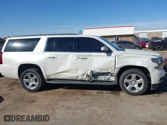 2015 Chevrolet Suburban LT with VIN 1GNSKJKC9FR717038, listed as a IAAI auction lot 41815942 with 123,095 mi miles and . Bid and sale history available at DreamBid. Image 13.