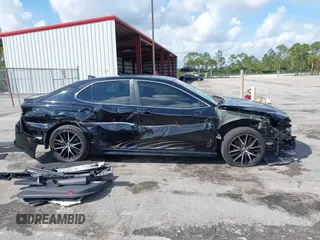 2023 Toyota Camry SE with VIN 4T1G11AK6PU741172, listed as a IAAI auction lot 41599909 with 56,668 mi miles and . Bid and sale history available at DreamBid. Image 13.