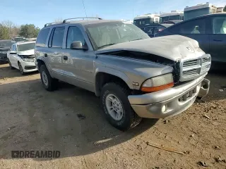 2000 Dodge Durango with VIN 1B4HS28Z6YF255687, listed as a Copart auction lot 84959164 with 189,369 mi miles and Salvage Title. Bid and sale history available at DreamBid. Image 12.