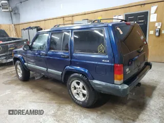 2000 Jeep Cherokee z VIN 1J4FF48S0YL153259, wystawiony jako Copart lot #52509955 z przebiegiem 204 042 mil mil oraz Czysty tytuł • Clean title. Historia ofert i sprzedaży dostępna na DreamBid. Obrazek 2.