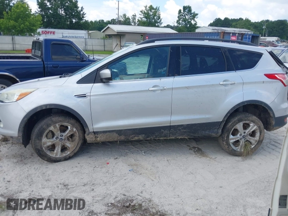 2014 Ford Escape SE with VIN 1FMCU9G9XEUD91390, listed as a IAAI auction lot 42561849 with 319,400 mi miles and . Bid and sale history available at DreamBid. Image 15.