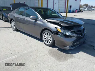 2019 Toyota Camry LE with VIN 4T1B11HK8KU204599, listed as a IAAI auction lot 42096889 with 76,518 mi miles and . Bid and sale history available at DreamBid. Image 1.