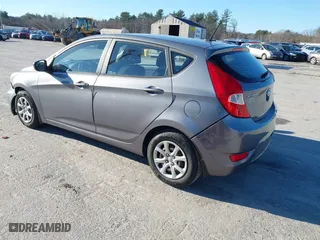 2014 Hyundai Accent GS with VIN KMHCT5AE6EU174338, listed as a IAAI auction lot 41096955 with 49,614 mi miles. Bid and sale history available at carsss.com. Image 3.