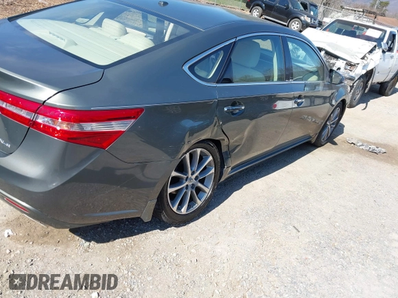 2014 Toyota Avalon Limited z VIN 4T1BK1EB0EU118032, wystawiony jako IAAI lot #41864586 z przebiegiem 72 477 mil mil oraz . Historia ofert i sprzedaży dostępna na DreamBid. Obrazek 4.
