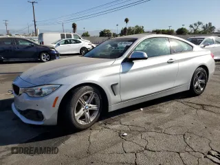 2014 BMW 4 Series 428i with VIN WBA3N3C55EK230794, listed as a Copart auction lot 66760454 with 72,727 mi miles and Salvage title. Bid and sale history available at DreamBid. Image 1.