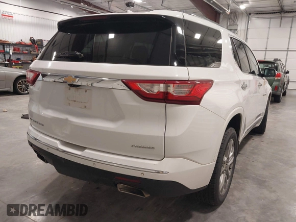 2021 Chevrolet Traverse Premier with VIN 1GNEVKKW7MJ218772, listed as a IAAI auction lot 42306743 with 106,898 mi miles and . Bid and sale history available at DreamBid. Image 4.