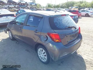 2015 Toyota Yaris L with VIN VNKKTUD31FA027763, listed as a IAAI auction lot 41886803 with 104,889 mi miles. Bid and sale history available at carsss.com. Image 3.