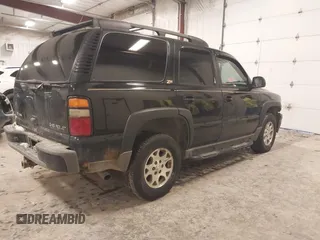 2004 Chevrolet Tahoe LS with VIN 1GNEK13T24R242907, listed as a IAAI auction lot 41496795 with 261,402 mi miles. Bid and sale history available at carsss.com. Image 4.