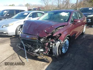 2013 Ford Fusion SE Hybrid with VIN 3FA6P0LU8DR206943, listed as a IAAI auction lot 41822643 with 141,484 mi miles. Bid and sale history available at carsss.com. Image 6.