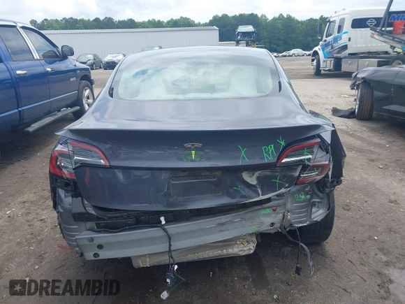 2023 Tesla Model 3 with VIN 5YJ3E1EAXPF628911, listed as a IAAI auction lot 42362410 with 25,387 mi miles and . Bid and sale history available at DreamBid. Image 17.
