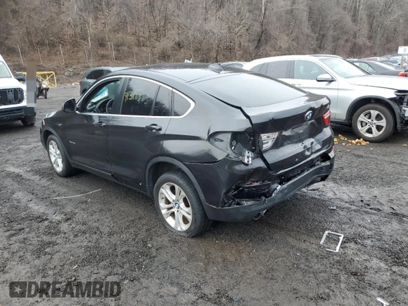 2015 BMW X4 xDrive28i with VIN 5UXXW3C54F0M89256, listed as a Copart auction lot 41388973 with 136,359 mi miles. Bid and sale history available at carsss.com. Image 2.