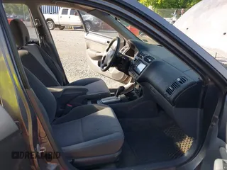 2004 Honda Civic EX z VIN 2HGES26784H507957, wystawiony jako IAAI lot #42302283 z przebiegiem 233 948 mil mil oraz . Historia ofert i sprzedaży dostępna na DreamBid. Obrazek 5.