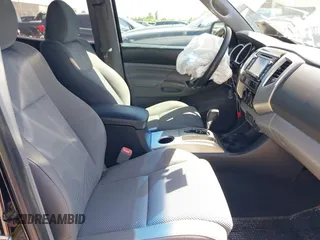 2014 Toyota Tacoma PreRunner with VIN 3TMJU4GN0EM160403, listed as a IAAI auction lot 41979894 with 169,941 mi miles. Bid and sale history available at carsss.com. Image 5.