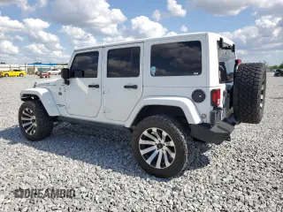 2016 Jeep Wrangler Unlimited Rubicon with VIN 1C4BJWFG9GL103312, listed as a Copart auction lot 52559465 with 79,692 mi miles and Salvage Title. Bid and sale history available at carsss.com. Image 2.
