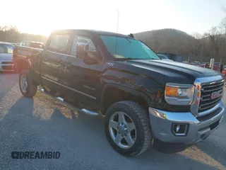 2015 GMC Sierra 2500HD available WiFi SLT with VIN 1GT12ZEG7FF606328, listed as a IAAI auction lot 41793799 with 94,107 mi miles. Bid and sale history available at carsss.com. Image 1.