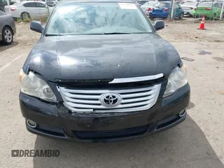 2009 Toyota Avalon XL with VIN 4T1BK36B79U327316, listed as a IAAI auction lot 42130918 with 184,948 mi miles. Bid and sale history available at carsss.com. Image 6.
