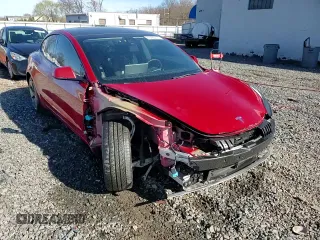 2022 Tesla Model 3 with VIN 5YJ3E1EA5NF184785, listed as a Copart auction lot 49466575 with 85,273 mi miles and Salvage Title. Bid and sale history available at DreamBid. Image 14.