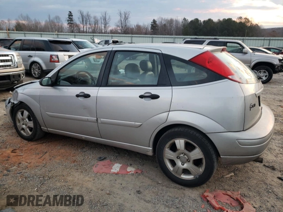 2004 Ford Focus with VIN 3FAFP37Z94R105076, listed as a Copart auction lot 82924224 with 218,253 mi miles and Clean title. Bid and sale history available at DreamBid. Image 2.