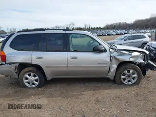 2006 GMC Envoy SLT with VIN 1GKDS13S962109198, listed as a IAAI auction lot 41874502 with 20,785 mi miles. Bid and sale history available at carsss.com. Image 12.