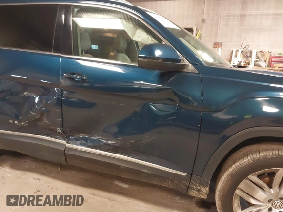 2018 Volkswagen Atlas SEL Premium with VIN 1V2NR2CA5JC597639, listed as a IAAI auction lot 41867470 with 99,642 mi miles and . Bid and sale history available at DreamBid. Image 6.