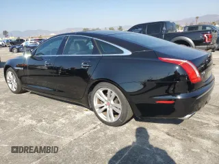 2011 Jaguar XJ with VIN SAJWA1CB4BLV05830, listed as a Copart auction lot 43007345 with 72,933 mi miles and Salvage title. Bid and sale history available at DreamBid. Image 2.