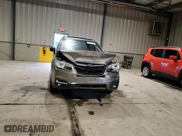 2018 Subaru Forester Touring z VIN JF2SJAWC4JH522454, wystawiony jako Copart lot #58204655 z przebiegiem 117 611 mil mil oraz Szkoda całkowita • Salvage title. Historia ofert i sprzedaży dostępna na DreamBid. Obrazek 14.
