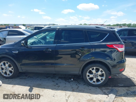 2015 Ford Escape Titanium with VIN 1FMCU0JX3FUB39808, listed as a IAAI auction lot 42212271 with 136,488 mi miles and . Bid and sale history available at DreamBid. Image 15.
