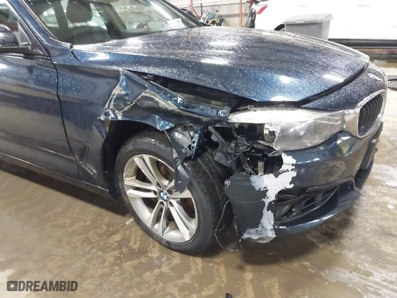 2014 BMW 3 Series Gran Turismo 328i xDrive with VIN WBA3X5C5XED557668, listed as a IAAI auction lot 41728522 with 123,393 mi miles. Bid and sale history available at carsss.com. Image 6.