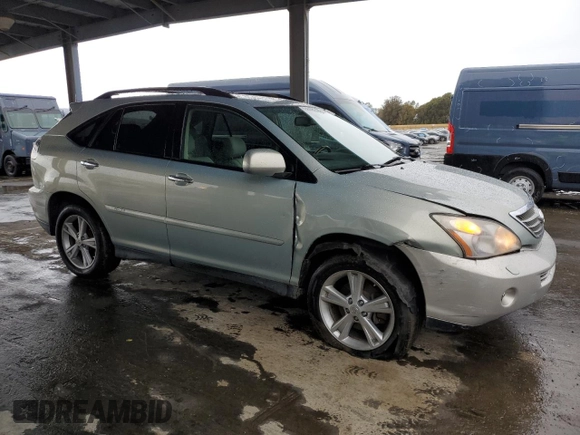2008 Lexus RX 400h with VIN JTJGW31U582006809, listed as a Copart auction lot 48992435 with 145,563 mi miles and Salvage Title. Bid and sale history available at DreamBid. Image 4.