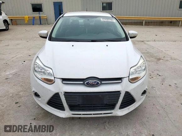 2013 Ford Focus SE z VIN 1FADP3F23DL108047, wystawiony jako Copart lot #57450795 z przebiegiem 67 518 mil mil oraz Szkoda całkowita • Salvage title. Historia ofert i sprzedaży dostępna na DreamBid. Obrazek 5.