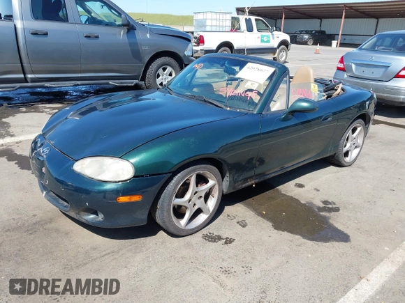 2001 Mazda MX-5 Miata with VIN JM1NB353410203981, listed as a IAAI auction lot 42028077 with Not Provided miles and . Bid and sale history available at DreamBid. Image 2.