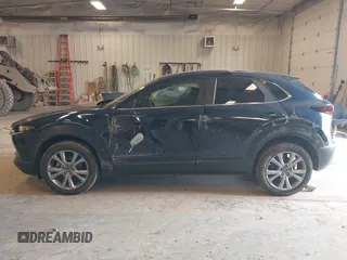 2021 Mazda CX-30 Select with VIN 3MVDMBBL8MM317065, listed as a IAAI auction lot 41819958 with 33,047 mi miles and . Bid and sale history available at carsss.com. Image 14.