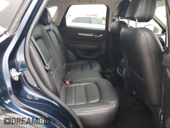 2019 Mazda CX-5 Grand Touring with VIN JM3KFBDM4K0676946, listed as a Copart auction lot 61040465 with Not provided miles and Salvage title. Bid and sale history available at DreamBid. Image 11.