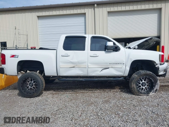2009 Chevrolet Silverado 1500 LTZ with VIN 3GCEK33M19G162955, listed as a IAAI auction lot 41851348 with 203,553 mi miles and . Bid and sale history available at DreamBid. Image 14.