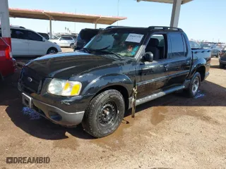2005 Ford Explorer Sport Trac XLS with VIN 1FMZU67K65UA48667, listed as a IAAI auction lot 41637238 with 213,925 mi miles. Bid and sale history available at carsss.com. Image 2.