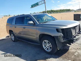 2017 Chevrolet Suburban LS with VIN 1GNSCGEC9HR355405, listed as a IAAI auction lot 41674594 with 170,312 mi miles and . Bid and sale history available at DreamBid. Image 1.