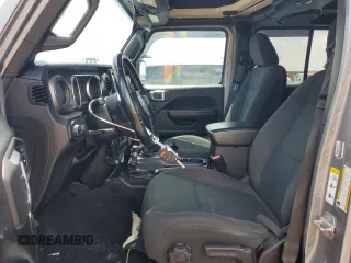 2020 Jeep Gladiator Sport S with VIN 1C6JJTAG9LL149872, listed as a Copart auction lot 58518095 with 118,910 mi miles and Salvage title. Bid and sale history available at DreamBid. Image 7.