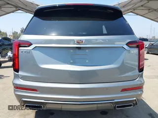 2023 Cadillac XT6 FWD Premium Luxury with VIN 1GYKPCRS6PZ163018, listed as a IAAI auction lot 42437403 with 21,366 mi miles and . Bid and sale history available at DreamBid. Image 17.