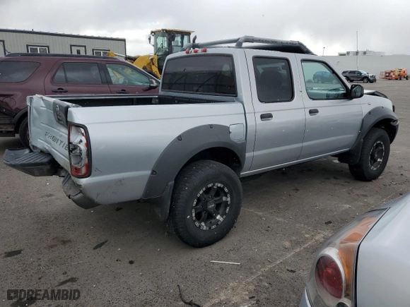 2001 Nissan Frontier 4WD SE with VIN 1N6ED27Y51C350934, listed as a Copart auction lot 79064134 with 246,280 mi miles and Salvage Title. Bid and sale history available at carsss.com. Image 3.