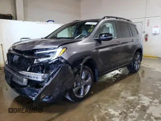 2021 Honda Passport Touring with VIN 5FNYF8H98MB012326, listed as a Copart auction lot 52165835 with 21,679 mi miles and Salvage Title. Bid and sale history available at carsss.com. Image 1.