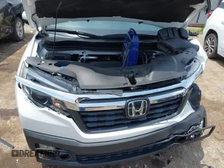 2020 Honda Ridgeline RTL with VIN 5FPYK3F51LB029859, listed as a IAAI auction lot 42462285 with 57,399 mi miles and . Bid and sale history available at DreamBid. Image 10.