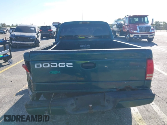 1998 Dodge Dakota SLT with VIN 1B7FL26X2WS685844, listed as a IAAI auction lot 41857719 with Not Provided miles and . Bid and sale history available at carsss.com. Image 16.