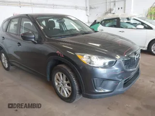 2014 Mazda CX-5 Sport with VIN JM3KE4BE5E0375360, listed as a IAAI auction lot 41788977 with 135,487 mi miles. Bid and sale history available at carsss.com. Image 1.
